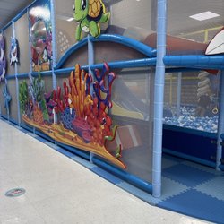 JJ’s Playhouse - Junior Play area, and hallway leading to party room.