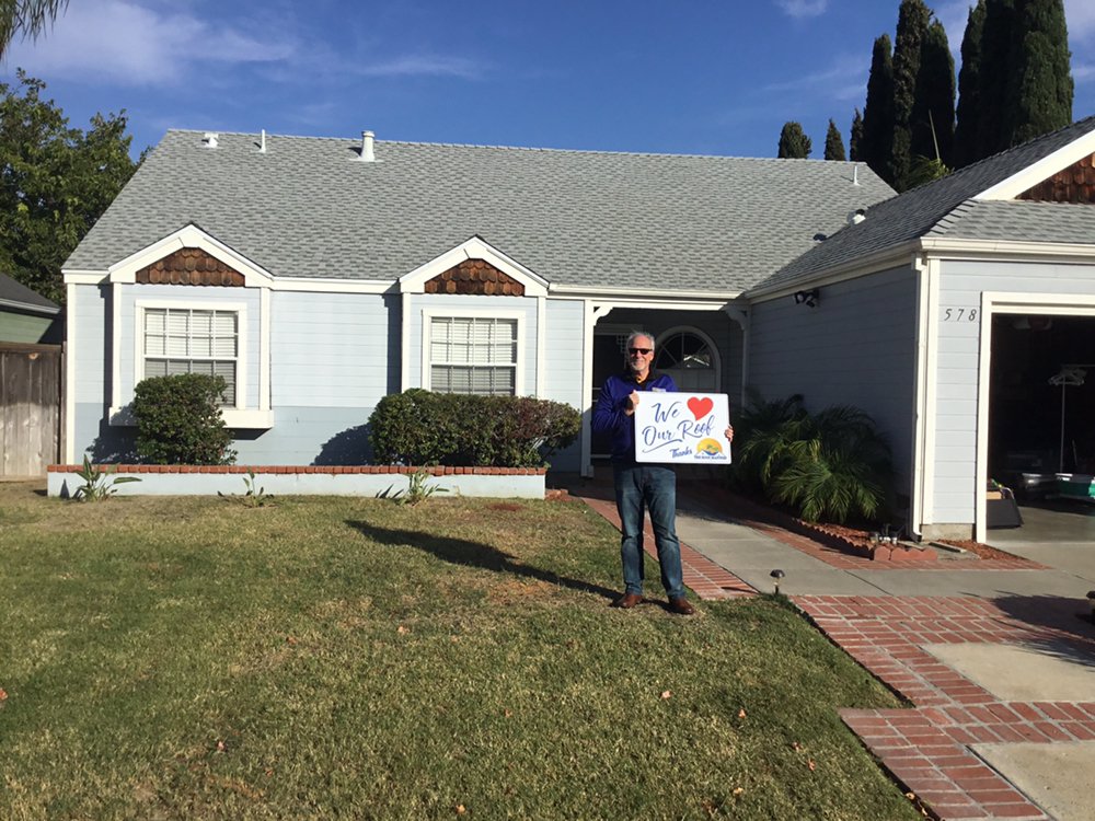 Slide of The Roof Masters