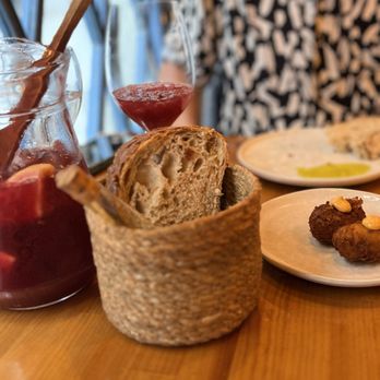 Arume - Sangria, croquettes, bread with a tube of amazing olive oil - Mediterranean Near Me - Barcelona, B Arume - Sangria, croquettes, bread with a tube of amazing olive oil - Mediterranean Near Me - Barcelona, B