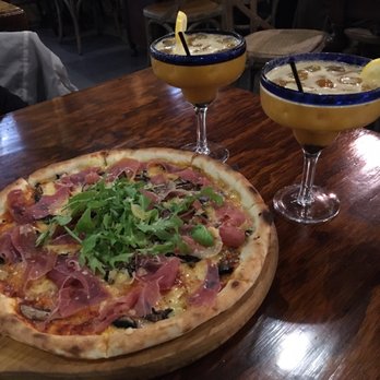 Elliott Stables - Pizza from the Italian place Passion fruit Margaritas from the Mexican place Both great! - Food Court Near Me - Auckland, AUK Elliott Stables - Pizza from the Italian place Passion fruit Margaritas from the Mexican place Both great! - Food Court Near Me - Auckland, AUK
