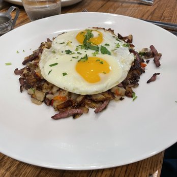 A'Bouzy - Corned Beef Brisket Hash - Crispy corned beef brisket, onion, pickled jalapeno, potato, sunny side up eggs - Champagne Bars Near Me - Houston, Texas A'Bouzy - Corned Beef Brisket Hash - Crispy corned beef brisket, onion, pickled jalapeno, potato, sunny side up eggs - Champagne Bars Near Me - Houston, Texas