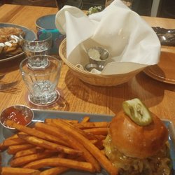 Dusty Trail Cafe & Steakhouse - Pork Sausage burger with sweet potato fries.