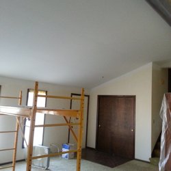 Doppler Construction - New ceiling in living room after being painted.