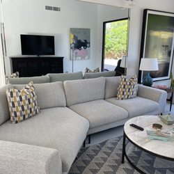 Scandinavian Designs - The cuddler couch is our favorite couch    It's modern but has that Scandinavian clean mid century look