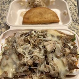 Pepito Mixto sandwich and Chorizo & Cheese Empanada