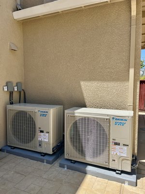 High‑Efficiency Daikin VRV System Upgrade – AC Replacement for Rebate Eligibility - This project involved removing two aging AC units that were no longer efficient and upgrading the home to a high‑efficiency Daikin VRV heat pump system. The homeowner wanted better comfort, lower energy usage, and eligibility for local rebate programs. We demoed all existing outdoor units and replaced them with new Daikin VRV condensers, paired with a matching Daikin air handler installed indoors.
The new VRV system provides precise temperature control, quieter operation, and significantly improved energy performance. The installation included updated refrigerant lines, electrical upgrades, proper condensate management, and full commissioning to meet rebate program requirements. The photos show the clean new air handler installation and the dual Daikin VRV outdoor units after setup.
This upgrade gives the homeowner a modern, efficient, all‑electric HVAC solution designed for long‑term reliability and maximum rebate savings. High‑Efficiency Daikin VRV System Upgrade – AC Replacement for Rebate Eligibility - This project involved removing two aging AC units that were no longer efficient and upgrading the home to a high‑efficiency Daikin VRV heat pump system. The homeowner wanted better comfort, lower energy usage, and eligibility for local rebate programs. We demoed all existing outdoor units and replaced them with new Daikin VRV condensers, paired with a matching Daikin air handler installed indoors.
The new VRV system provides precise temperature control, quieter operation, and significantly improved energy performance. The installation included updated refrigerant lines, electrical upgrades, proper condensate management, and full commissioning to meet rebate program requirements. The photos show the clean new air handler installation and the dual Daikin VRV outdoor units after setup.
This upgrade gives the homeowner a modern, efficient, all‑electric HVAC solution designed for long‑term reliability and maximum rebate savings.