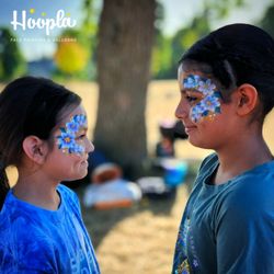 Hoopla Face Painting & Balloons - Speed Painting at a community event in Seattle
