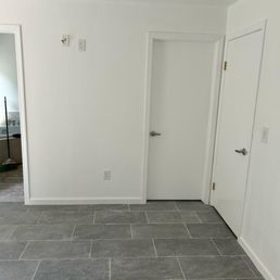 moved the wall, installed tiles, painted walls moved the wall, installed tiles, painted walls
