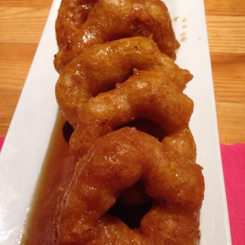 Takatis - Dessert! Picarones - reminds me of a cross between a fritter and a funnel cake. mildly sweet squash dessert with molasses syrup. - Peruvian Near Me - Van Nuys, California Takatis - Dessert! Picarones - reminds me of a cross between a fritter and a funnel cake. mildly sweet squash dessert with molasses syrup. - Peruvian Near Me - Van Nuys, California