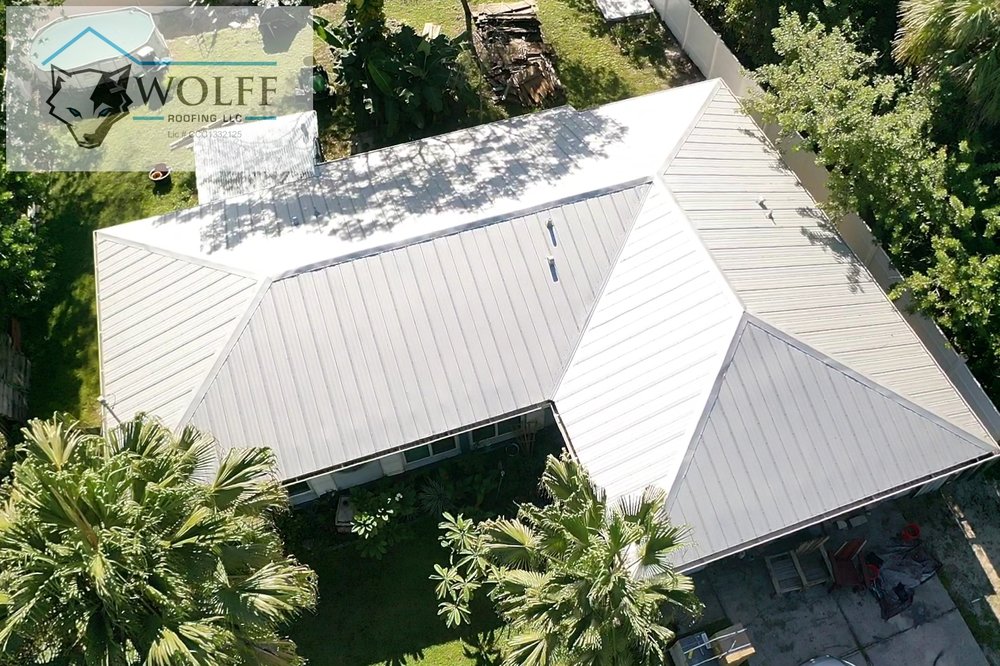 Slide of Wolff Roofing