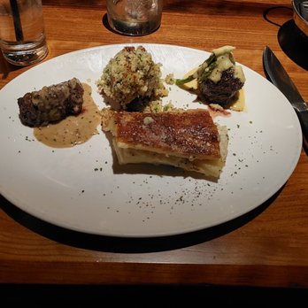 Stoney River - Trio of Filet Medallions with Au Gratin Potatoes - Steakhouses Near Me - Duluth, Georgia Stoney River - Trio of Filet Medallions with Au Gratin Potatoes - Steakhouses Near Me - Duluth, Georgia