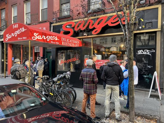 Photo of Sarge's Delicatessen & Diner - New York, NY, US. Outside the deli on a Saturday in December