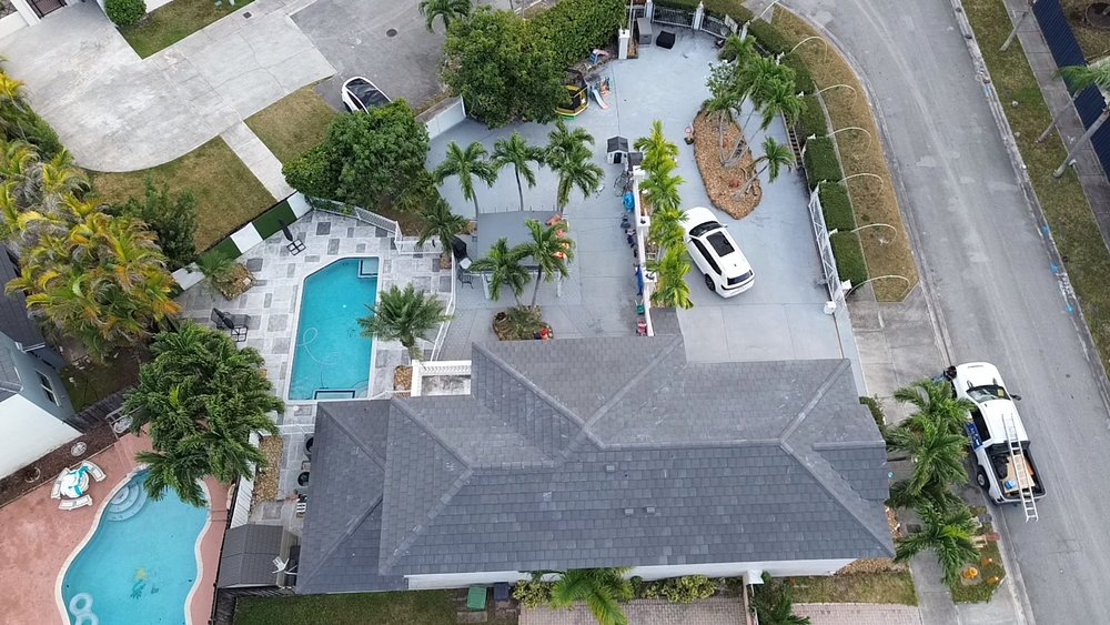 Slide of MC Roofing Service