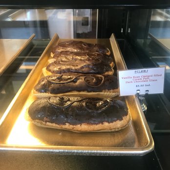 Cakes by Karl - Chocolate Eclairs filled with vanilla creme custard. My sister's favorite. - Desserts Near Me - Vallejo, California