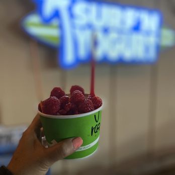 Surf N' Yogurt - person holding a bowl of raspberries - Ice Cream & Frozen Yogurt Near Me - Ventura, California Surf N' Yogurt - person holding a bowl of raspberries - Ice Cream & Frozen Yogurt Near Me - Ventura, California