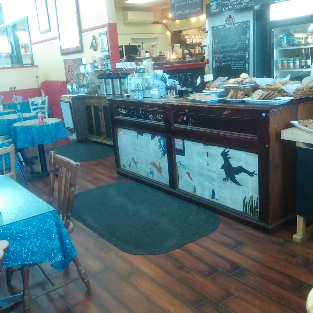 View of dining area and counter View of dining area and counter