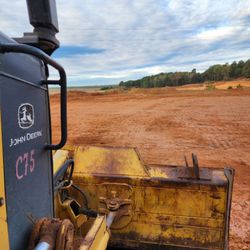 McVicar Land Management & Solutions - Helping another company to fill a pit with discard subsoil. Smooth and solid ground was required for the large number of semis coming in.