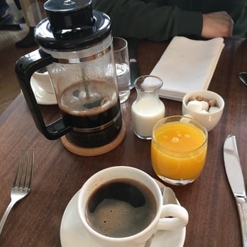 Tilikum Place Cafe - French press and orange juixe - New American Near Me - Seattle, Washington Tilikum Place Cafe - French press and orange juixe - New American Near Me - Seattle, Washington