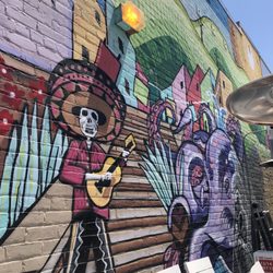 Mariachi mural - Mariachi band in the background.