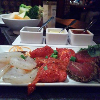 The Melting Pot - Shrimps, Tennessee pork and aged Angus beef - Fondue Near Me - Gaithersburg, Maryland The Melting Pot - Shrimps, Tennessee pork and aged Angus beef - Fondue Near Me - Gaithersburg, Maryland