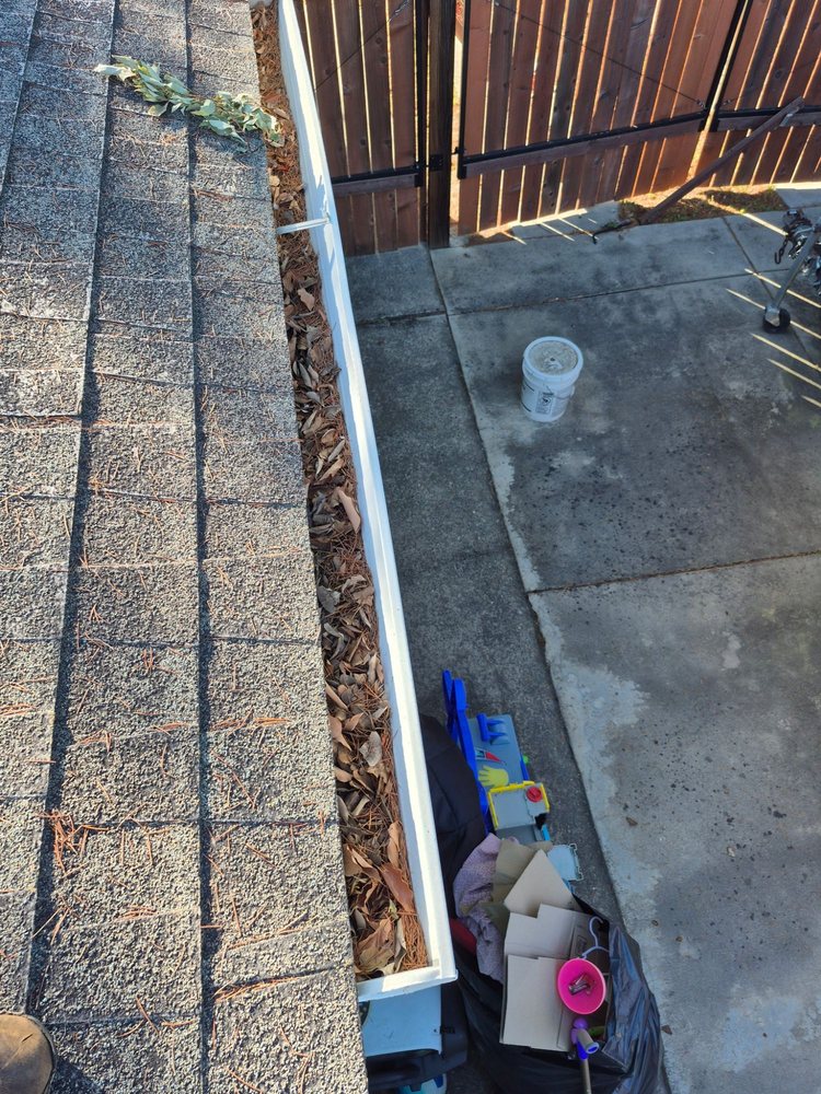Slide of Cleaning Gutters Service
