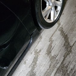 Deer Park Auto Body - Misaligned Separation of rocker molding, in addition to flat leaking tire.