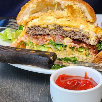Field House - Cross section of Ultimate Breakfast Burger ($18, 9/29/24) - Coffee & Tea Near Me - Mill Creek, Washington Field House - Cross section of Ultimate Breakfast Burger ($18, 9/29/24) - Coffee & Tea Near Me - Mill Creek, Washington