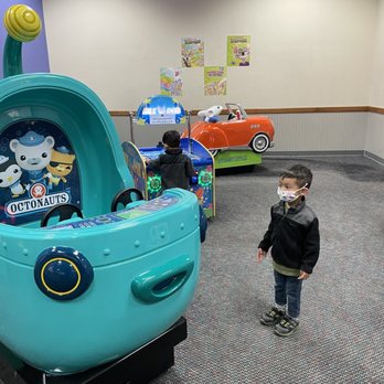 Chuck E. Cheese - The toddler section .... there's an spot in the carpet that looks discolored. Couldn't tell if it's wet or stained - Pizza Near Me - Darien, Illinois