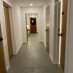 SCP Mendocino Inn and Farm - Hallway towards chicken farm outside
