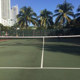 Cool morning spot for tennis in downtown Miami. First come first serve right next to volleyball courts