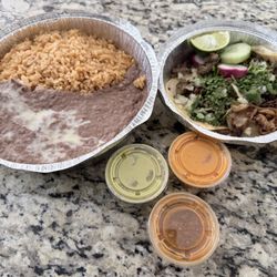 La Azteca - Two Carne Asada Street Tacos w/ side of rice & beans along with their three salsas