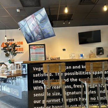 Bomb Burger - a bar with a tv in the background - Chicken Wings Near Me - Bergenfield, New Jersey