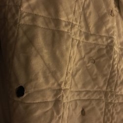 Candlelight Inn & Lounge - The blanket with cigarette holes