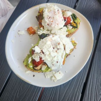 Aioli - Avocado toast with poached eggs. - Cafes Near Me - West Palm Beach, Florida Aioli - Avocado toast with poached eggs. - Cafes Near Me - West Palm Beach, Florida