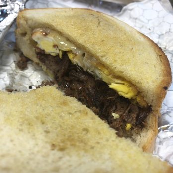 Meat Boss - Cottage Hill - Brisket breakfast Sandwhich with egg and pepper jack on sour dough - Barbeque Near Me - Mobile, Alabama Meat Boss - Cottage Hill - Brisket breakfast Sandwhich with egg and pepper jack on sour dough - Barbeque Near Me - Mobile, Alabama
