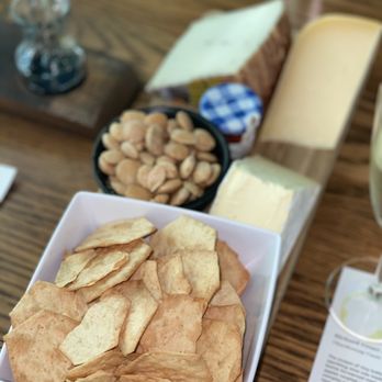 Rosenblum Cellars - Charcuterie board featuring GF crackers, Marcona almonds, honey, tripe crème Brie, manchego, and aged Gouda - Venues & Event Spaces Near Me - Oakland, California