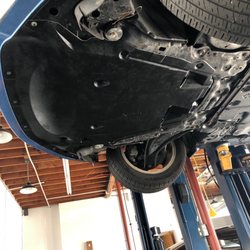 Photo of EVFixMe - Costa Mesa, CA, United States. Nissan Leaf front under cover replaced.