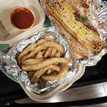 Paseo - Calamari with red sauce and the roasted corn - Caribbean Near Me - Seattle, Washington Paseo - Calamari with red sauce and the roasted corn - Caribbean Near Me - Seattle, Washington