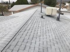 Slide of Escandon Roofing