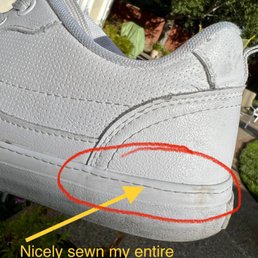 White sneaker, repaired . White sneaker, repaired .