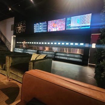 Overflow - View of their many taps. - Wine Bars Near Me - Mooresville, North Carolina