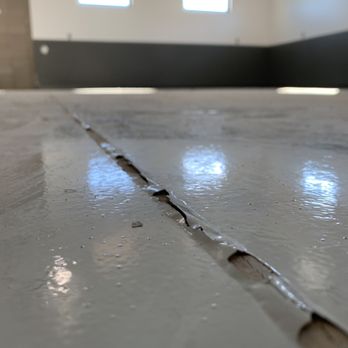 Premier Custom Coatings - a crack in the floor - Flooring Near Me
