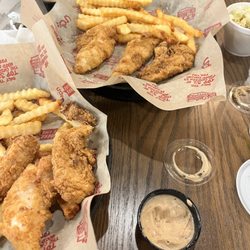 Huey Magoo's Chicken Tenders - 8 piece tender meal split between us.