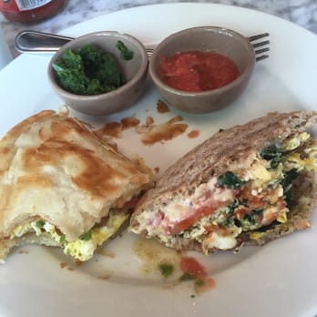 Batata - On the left Malawach, on the right spinach egg and halloumi pita - Middle Eastern Near Me - Brooklyn, New York