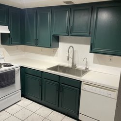 Benjamin Moore - Falcon Paints Outlet - Finished cabinet painting job with hunter green from benjamin moore.