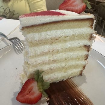 Peninsula Grill - World famous 12 layer coconut cake - New American Near Me - Charleston, South Carolina Peninsula Grill - World famous 12 layer coconut cake - New American Near Me - Charleston, South Carolina