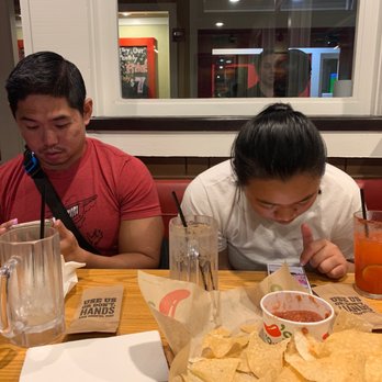 Chili's - On their phones. . . - Tex-Mex Near Me - Mililani, Hawaii Chili's - On their phones. . . - Tex-Mex Near Me - Mililani, Hawaii