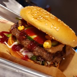 The Slip - Thai PB&J. Lime chili roasted peanuts, ginger peanut sauce, sriracha jam, pickled cucumber
