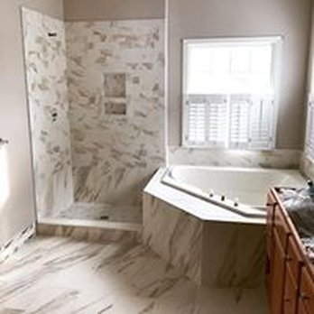 Serrato Flooring - a bathroom with a corner tub - Flooring Near Me - Dagsboro, Delaware Serrato Flooring - a bathroom with a corner tub - Flooring Near Me - Dagsboro, Delaware