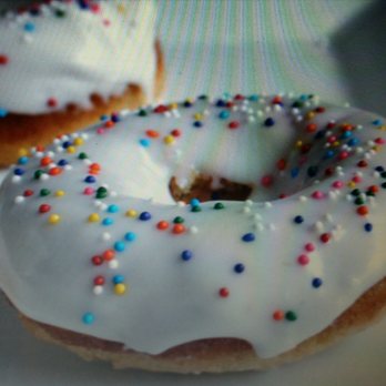 Best Donuts - a white frosted donut with sprinkles - Donuts Near Me - Ventura, California